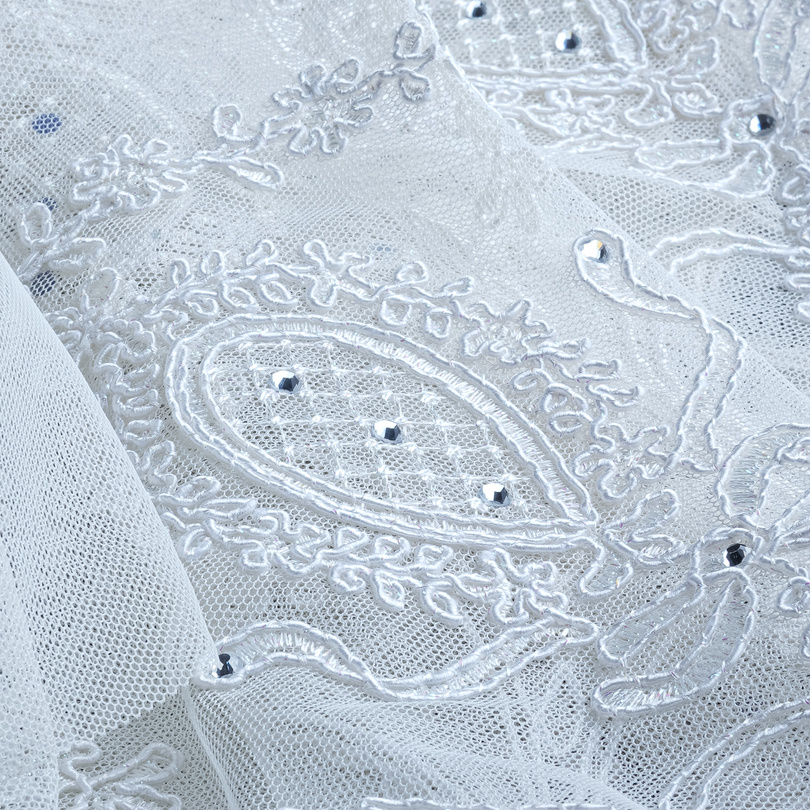 White sheer curtain with beaded embroidery
